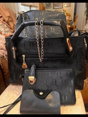 Women's Black Tote Bag with Gold Accents and Matching Accessories